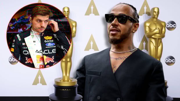 Hamilton in black suit with Oscars-themed awards background featuring circular inset of Verstappen in Red Bull garage in race suit