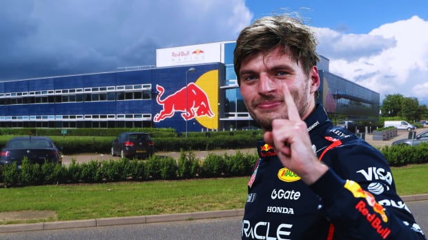 Verstappen in Red Bull race suit holding up number 1 finger with Red Bull HQ building edited in the background